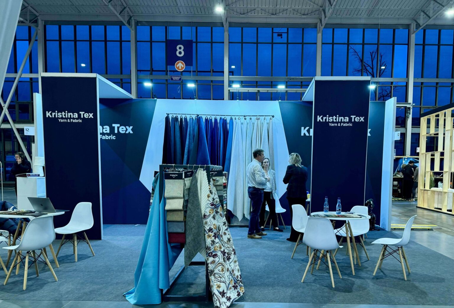 Kristina-Tex exhibition stand showcasing yarns and fabrics